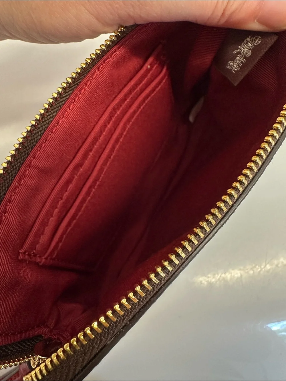 Coach Corner Zip Wristlet with Red Leather Stripe